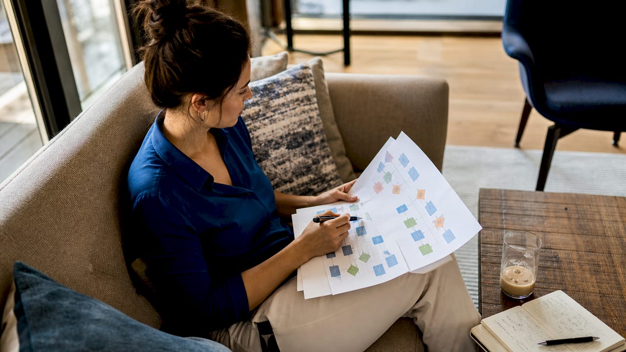 Marketing manager reviewing lead generation workflow
